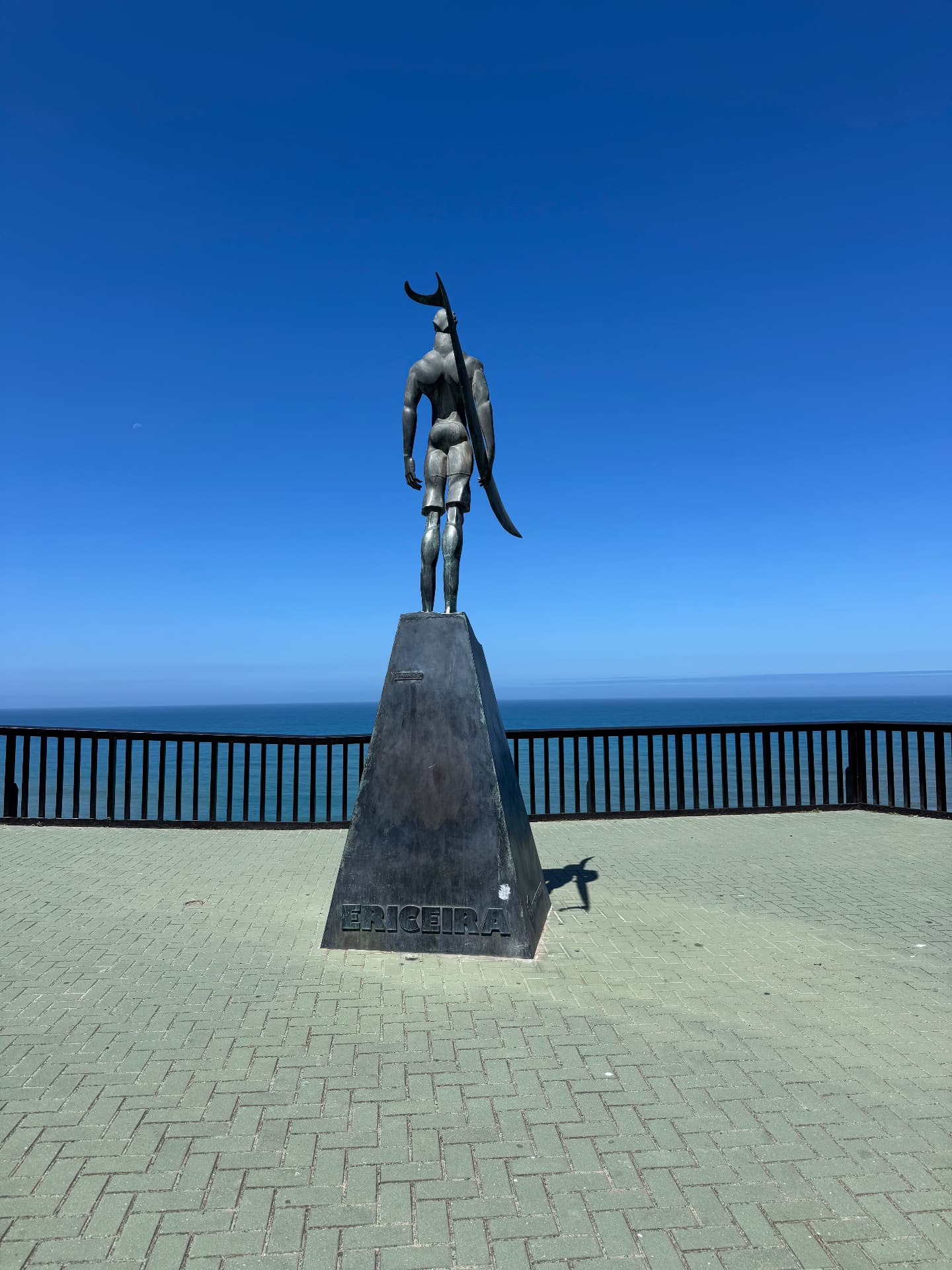 The Ericeira surfer statue above the Atlantic