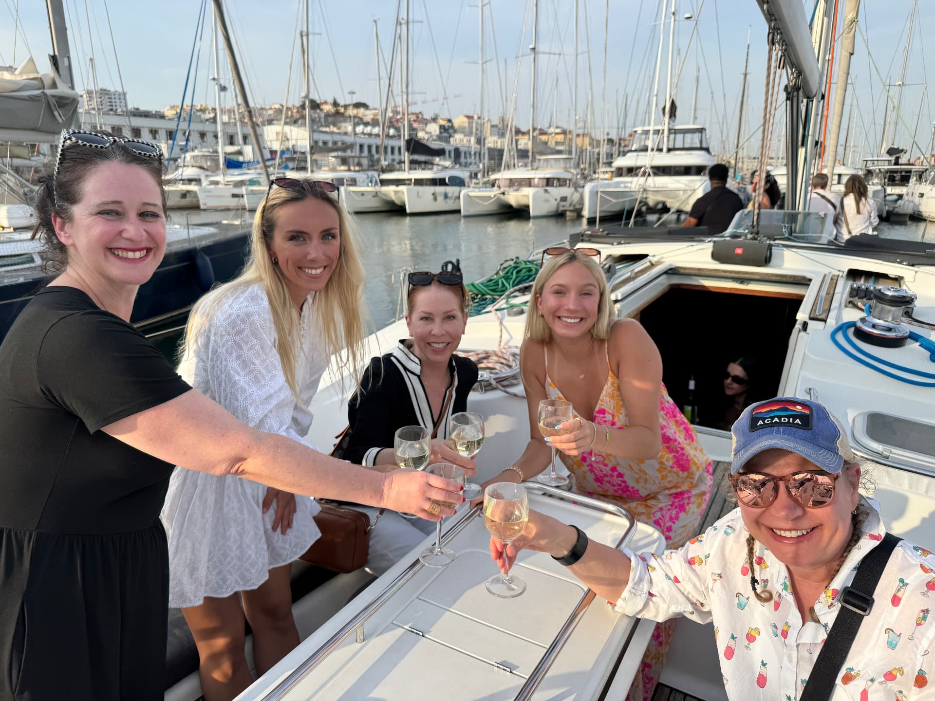 A toast on the boat in the marina at golden hour