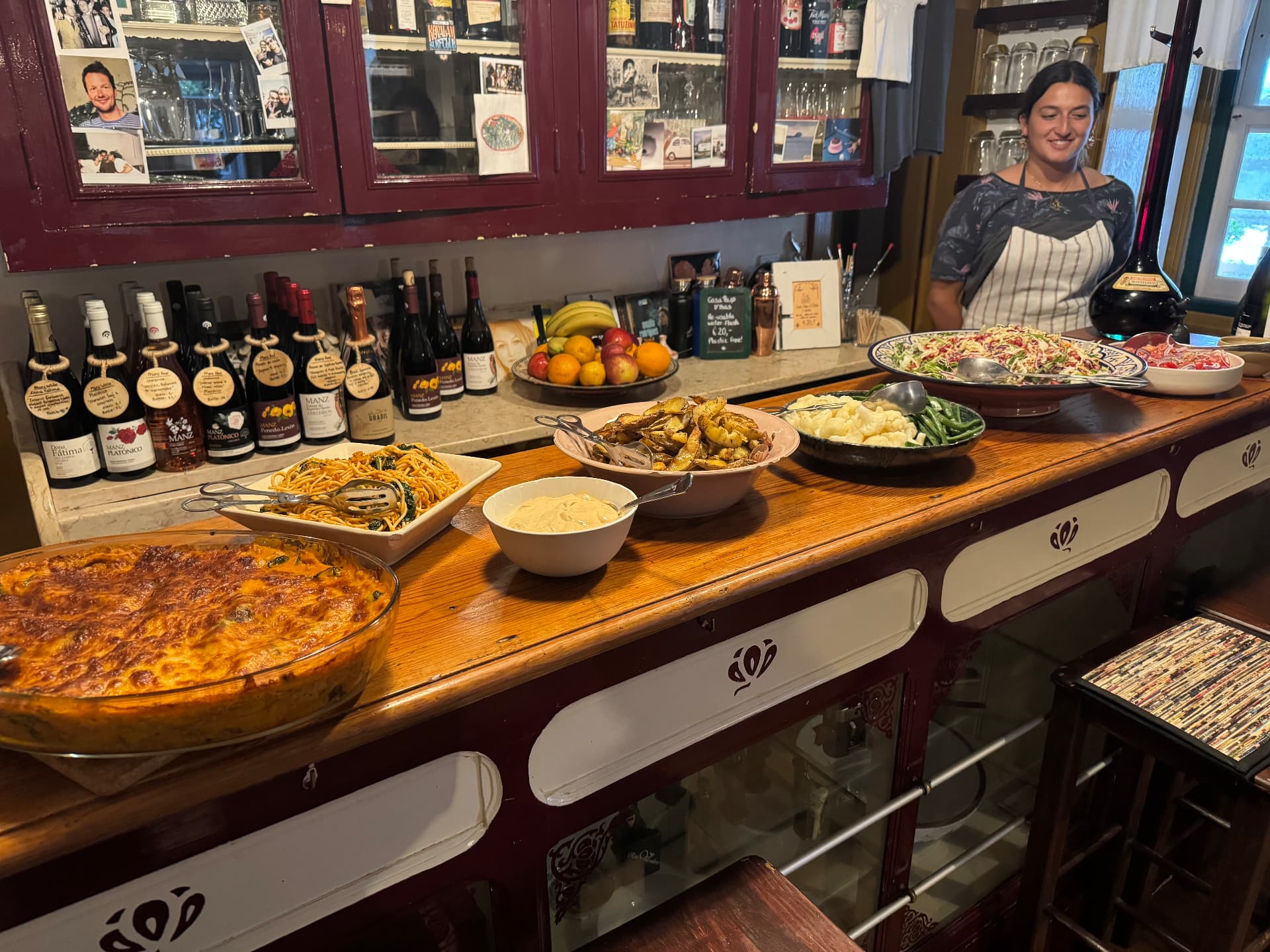 Dinner buffet laid out on the casa's wooden bar