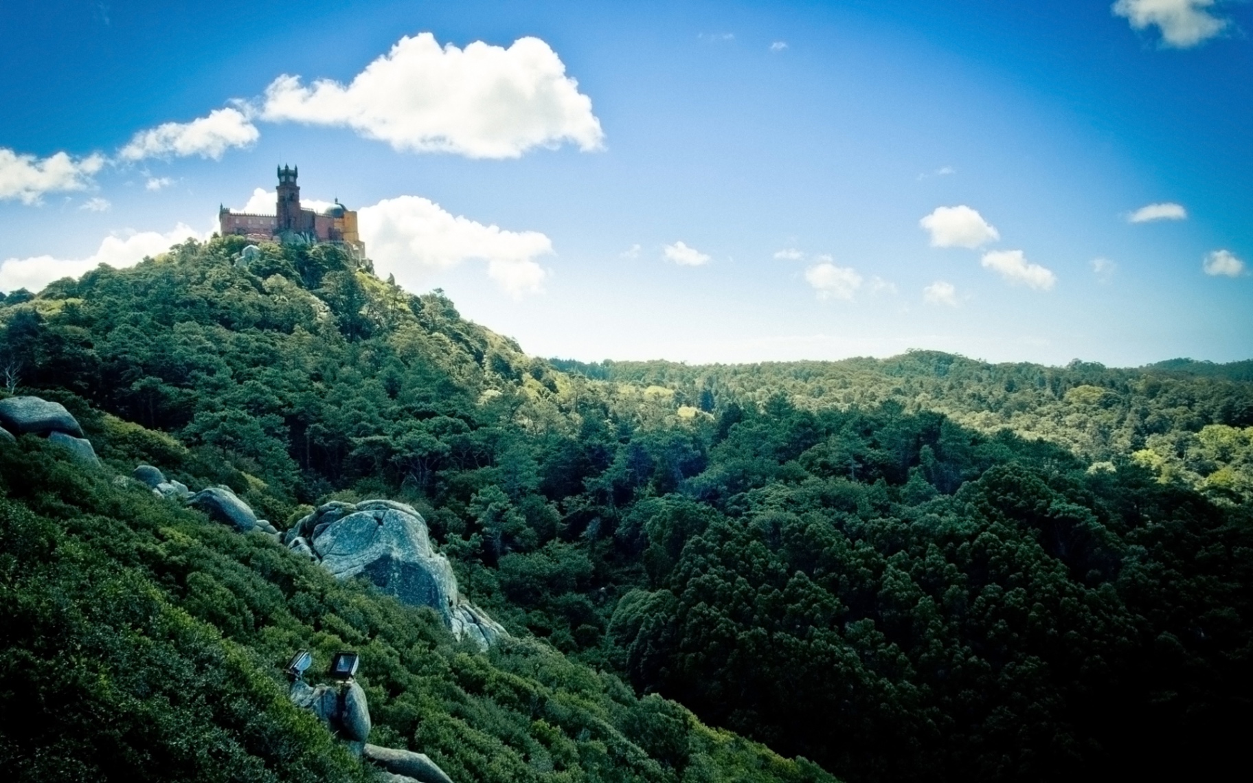 Pena Palace rising above the forested hills of Sintra-Cascais
