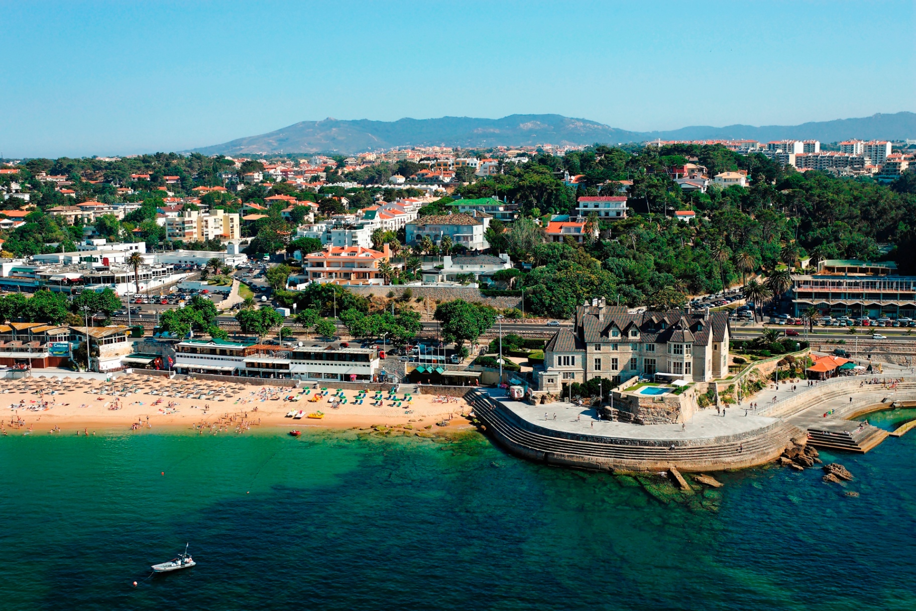 The turquoise bay and old town of Cascais